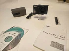 Nikon Coolpix P330 Digital Camera 12.2 MP 5x Optical Zoom VGUC w Charger Manuals