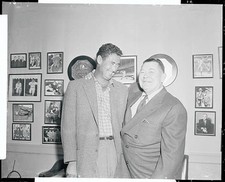 Red Sox owner Tom Yawkey r hugs favorite baseball player Ted Will- 1956 Photo 1