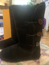 Women’s bear paw black suede and fur boots