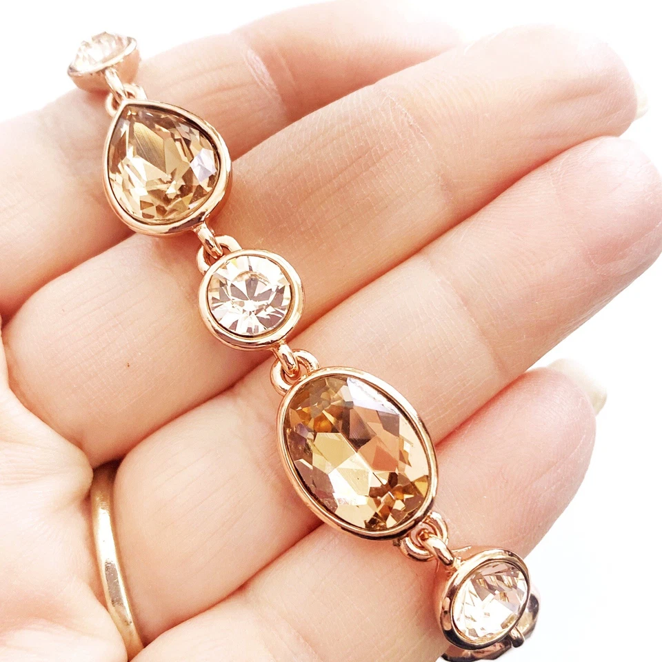 Pulsera de cristal de oro rosa Givenchy.  Champagne y piedras transparentes. Foto 3 de 4