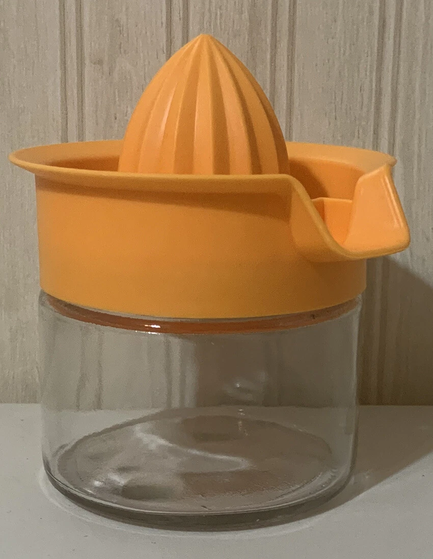 Juicer with glass clearance container