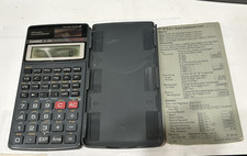 Vintage Casio calculator w/ Quick reference card works but window display cloudy