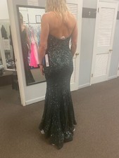 Long designer gown size 10 black and green- only worn for a few hours