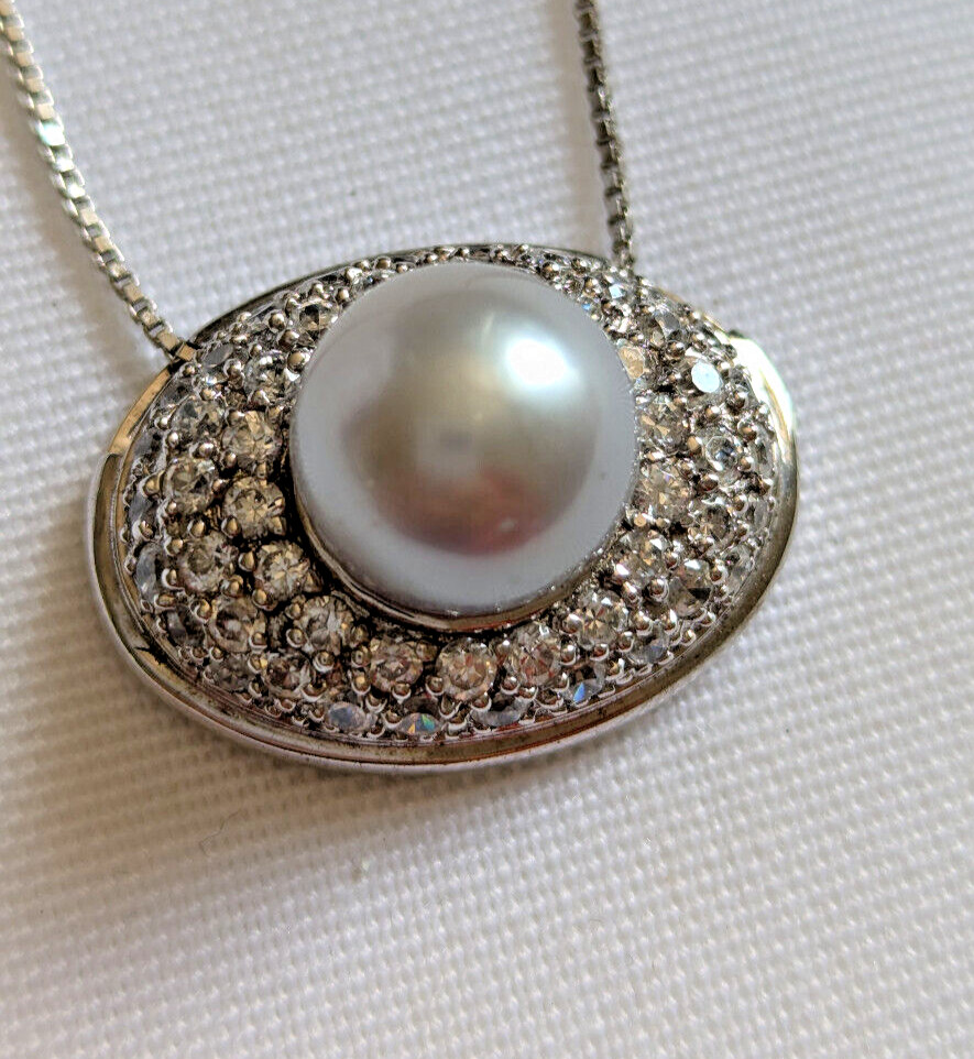 Pendentif perle de Tahiti grise sur argent 925, le cadeau d'anniversaire idéal