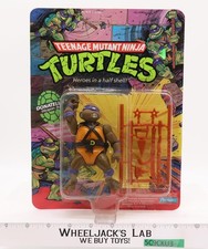 Donatello 10 Back Teenage Mutant Ninja Turtles TMNT 1988 Playmates NEW SEALED