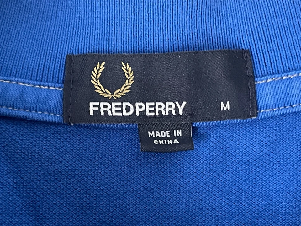 Camisa polo Fred Perry para hombre azul medio manga corta Foto 3 de 4