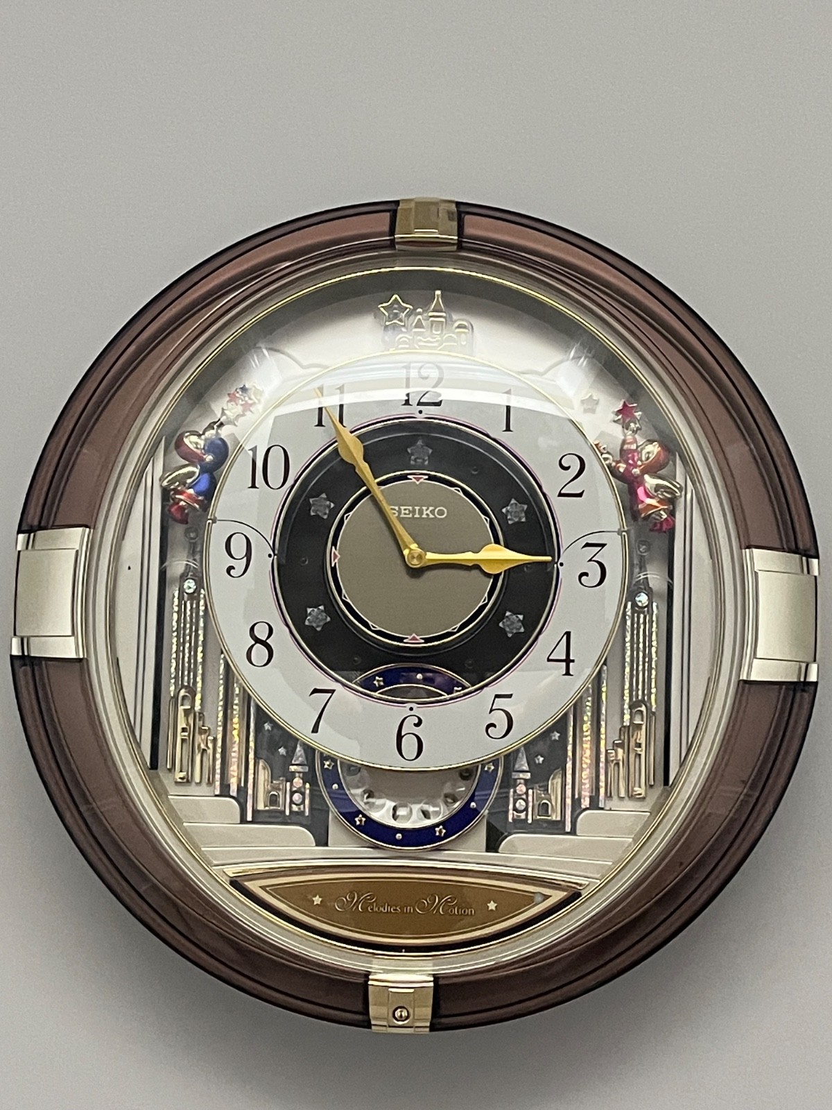 Seiko “Melodies in Motion” Musical Wall Clock-Rotating Pendulum, Elegant Design