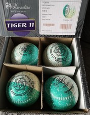 Henselite Tiger 11 bowls size 2 date stamp 34