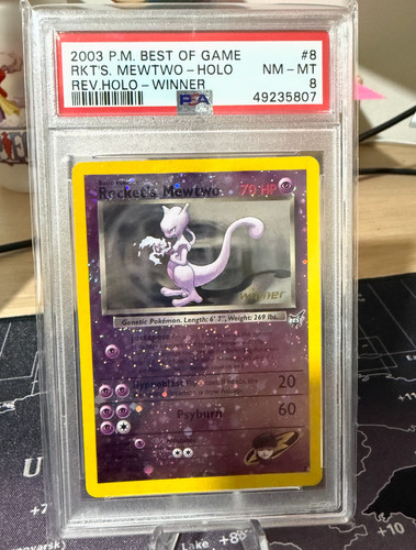Rocket's Mewtwo graded PSA 8 for sale on eBay