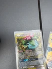 Venusaur & Snivy GX 1/236 Sm-Cosmic Eclipse Holo