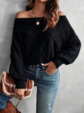 Off-shoulder knitted sweater with puff sleeves, available in black and green