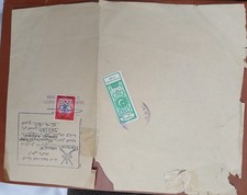 1980 OMAN AND PAKISTAN REVENUE STAMPS ON DOCUMENT