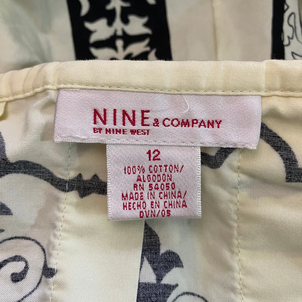 Falda para mujer Nine & Company talla 12 negra crema floral línea A hasta la rodilla Foto 3 de 4