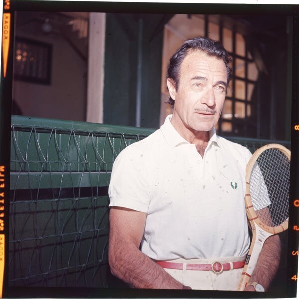 Gilbert Roland 1950's Tennis Photo Shoot holding racquet Ori