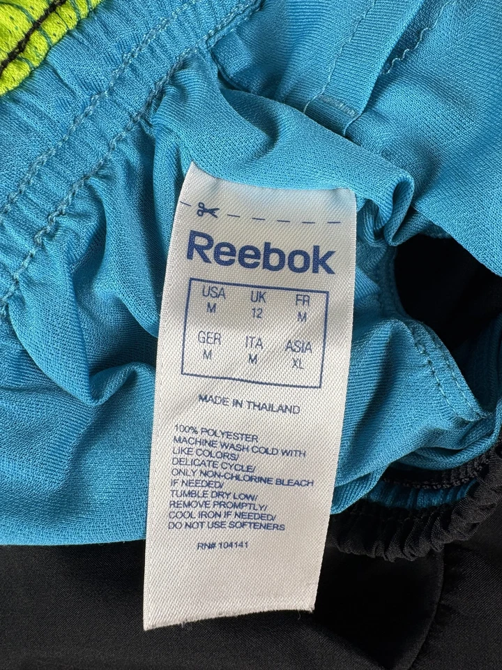 Pantalones Cortos de Correr Reebok PlayDry para Mujer Medianos Ligeros Atléticos Gimnasio Entrenamiento Foto 3 de 4