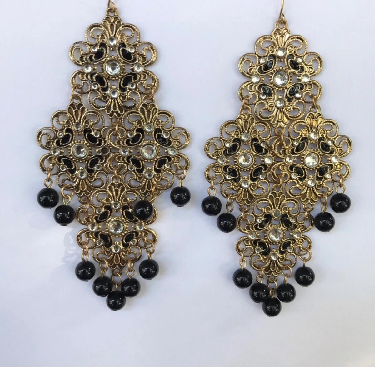 Dramatic black and gold coloured drop earrings eBay