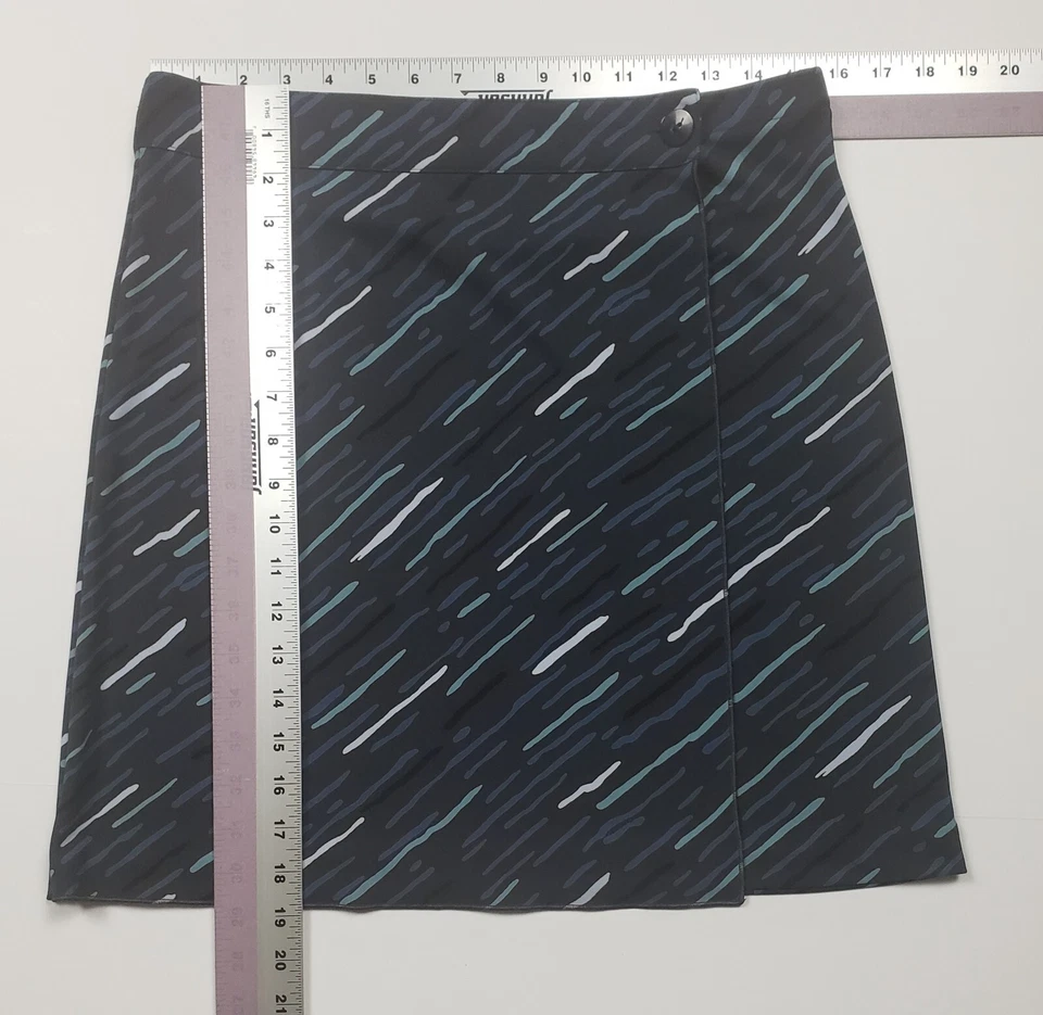 Falda envolvente simulada Kenneth Cole poliéster negra/azul/verde azulado para mujer pequeña usada Foto 4 de 4