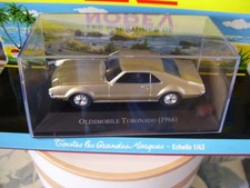 Collection Miniature Film U.S.A Oldsmobile Toronado Gold  1966 Boite 1/43