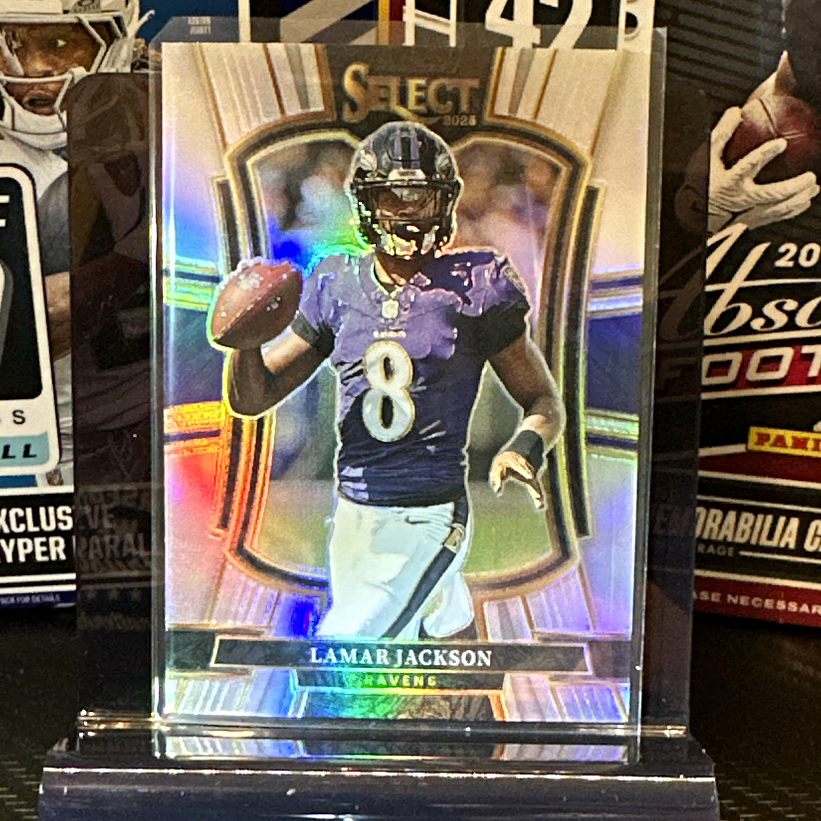 Lamar Jackson 2025 Panini Select #160 Premier Level Silver Prizm Shock Ravens