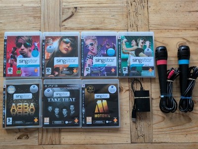 Singstar PS3 7 Spiele Bundle kabelgebunden zwei Mikrofone USB Adapter Singstore Pop ABBA