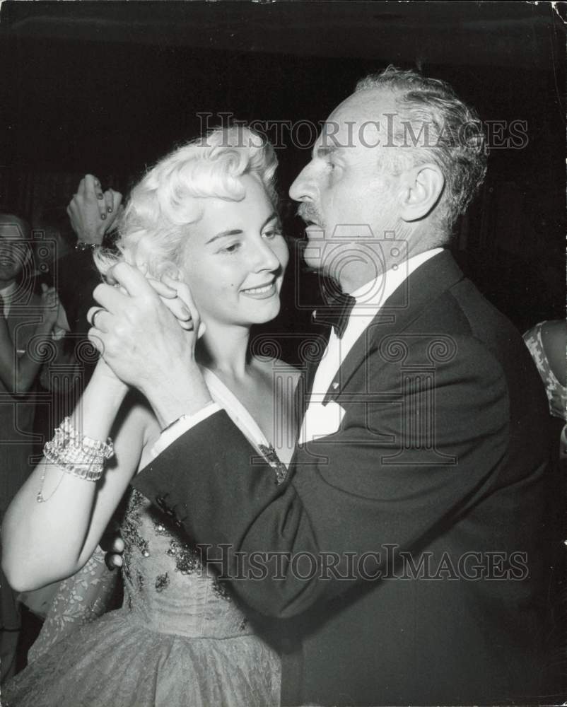 Press Photo Darryl Zanuck dances with daughter Darrylnn at the party - kfa46835