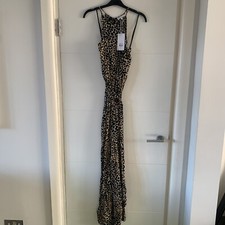 warehouse cheetah jumpsuit size 12 rrp  52