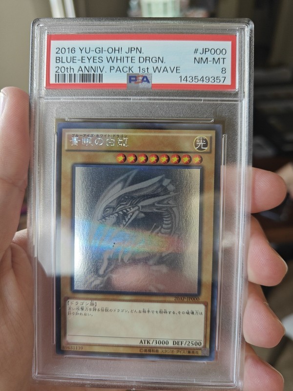 PSA 8 Yu-Gi-Oh! Blue-Eyes White Dragon Ghost Rare Card 20AP-JP000