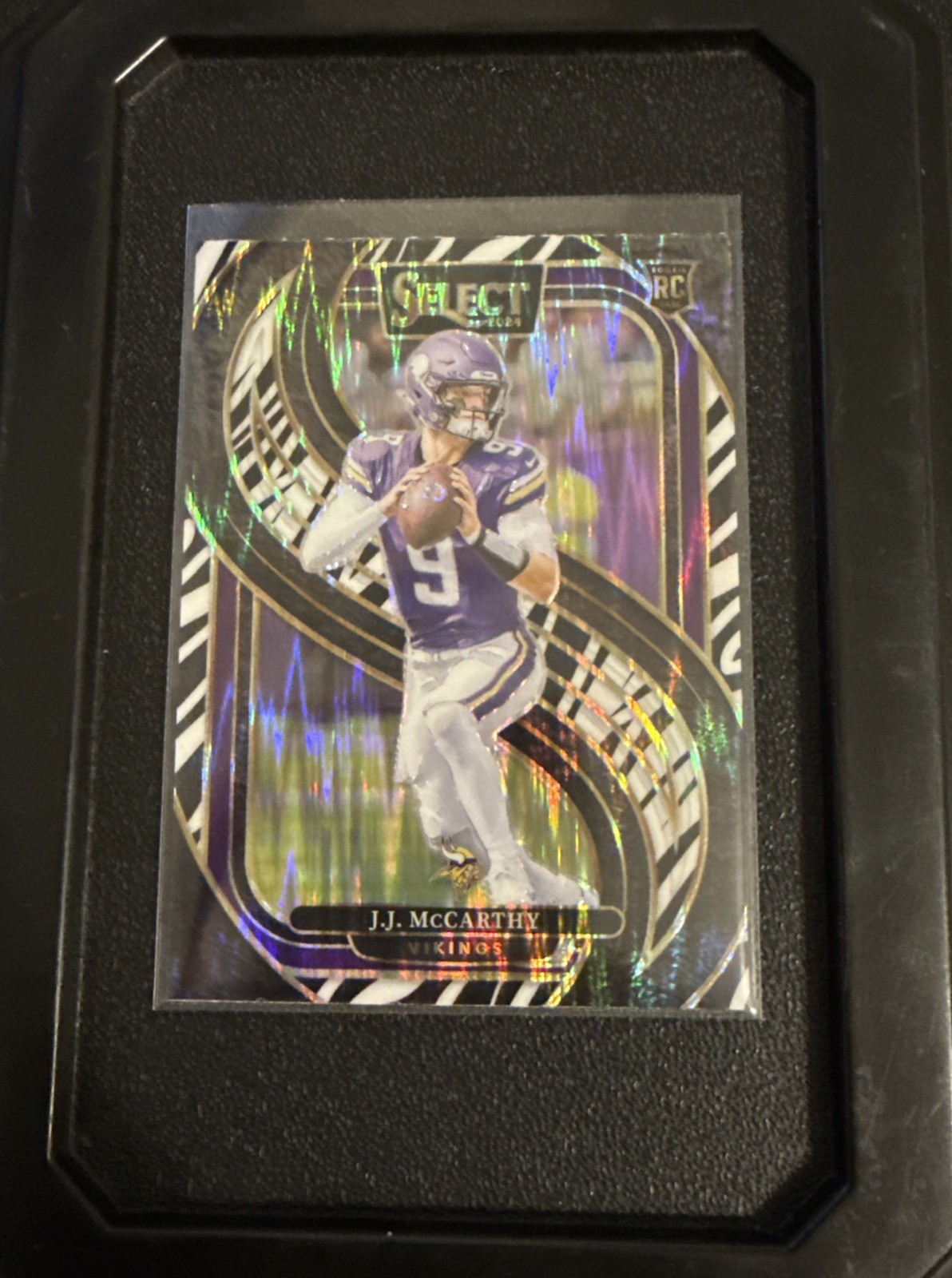 2024 Panini Select Premier Level Zebra Prizm #134 JJ McCarthy RC Rookie