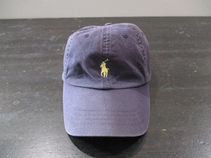 purple and yellow polo hat