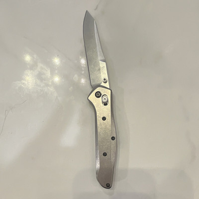 Benchmade Osborn. Custom titanium handles. S30v premium steel