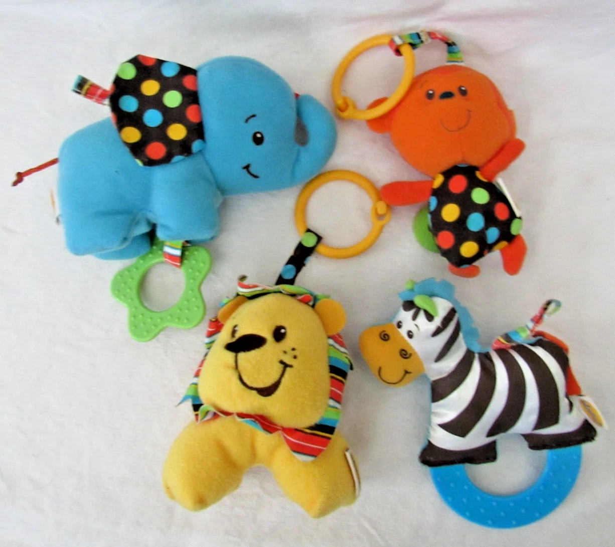 Lot /4 Infantino Crib Stroller Toys Rattles Teethers Elephant Monkey Lion Zebra