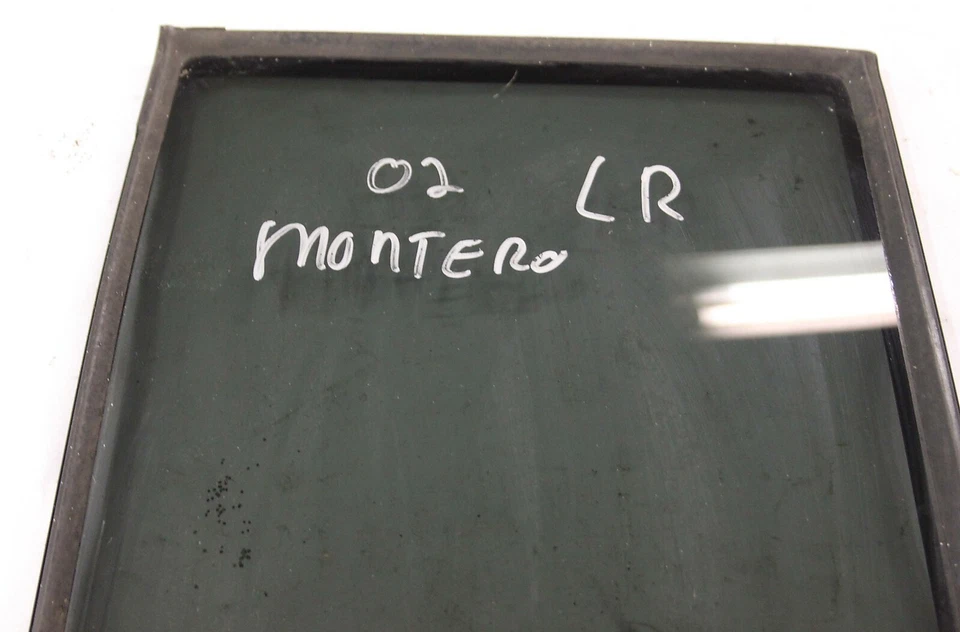 Montero Limited 2002 fabricante de equipos originales lado izquierdo puerta trasera ventilación ventana vidrio 06 05 04 Foto 3 de 4