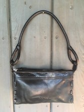 XOXO Small Black Whipstitched Purse, rounded handle, zippered compartment, vinyl