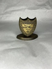 Dom Perignon champagne bronze shield menu letter holder paperweight RARE USED