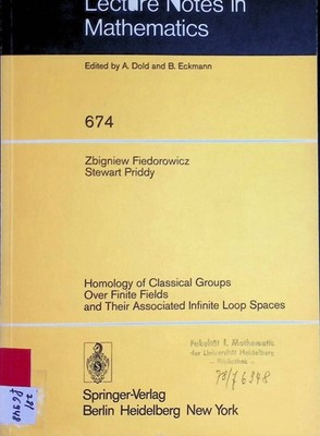 Homology of classical groups over finite fields and their associated infinite lo