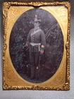 1/4 PLATE TINTYPE, UNION SOLDIER STUDIO PORTRAIT IN W/ SHAKO HAT, RIFLE & SWORD