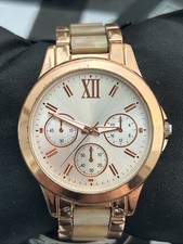 Rose Gold Tone Case Silver Dial Women’s Quartz Watch