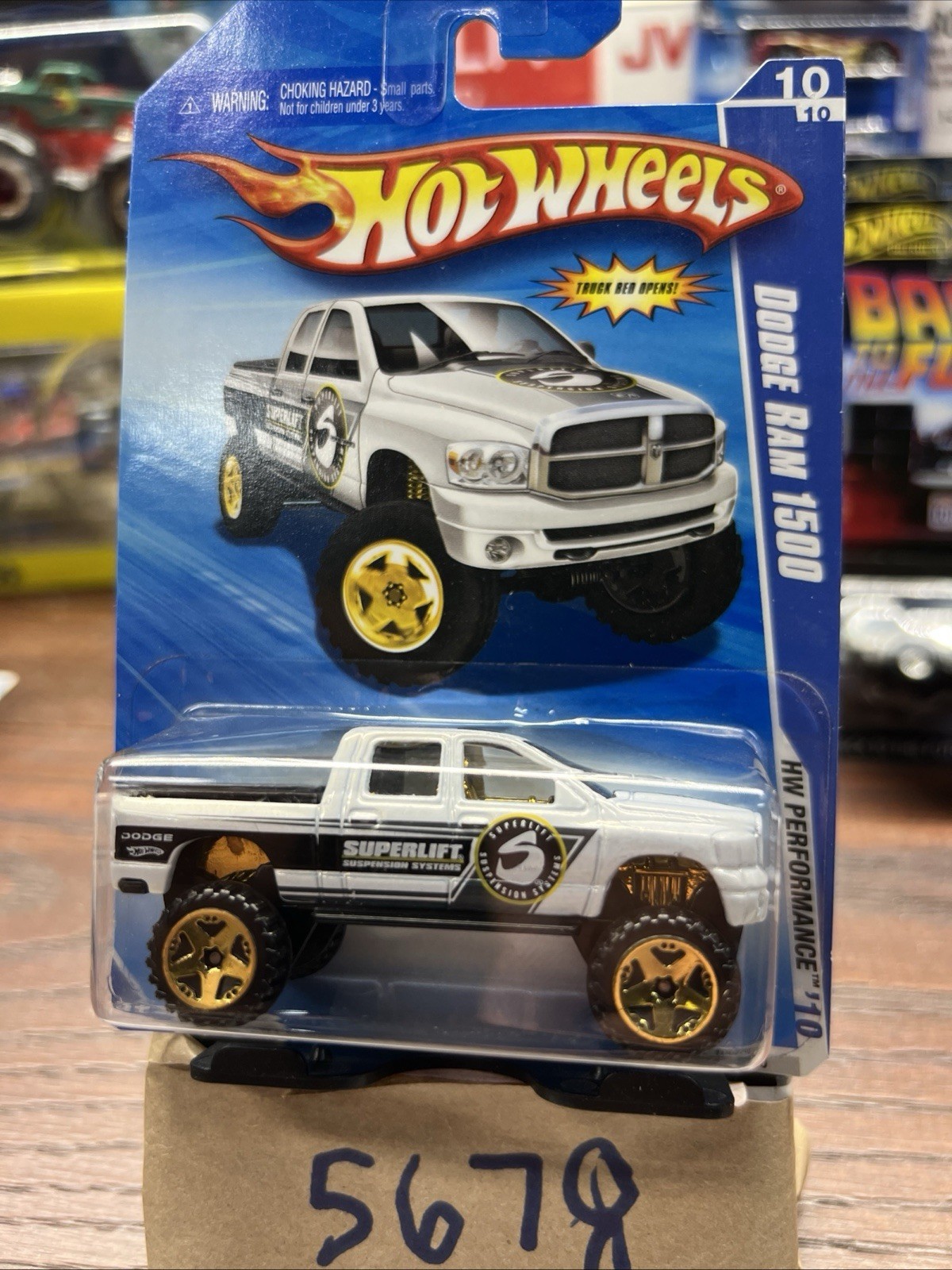 2010 Hot Wheels #108 Performance 10/10 DODGE RAM 1500 White Variant w/GoldUT5Sp