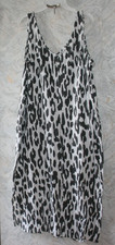 EXPRESS midi dress.Large.White/black animal printed Sleeveless Pockets Stretch