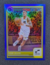 2023 NBA Hoops Premium Stock #97 John Collins Blue Prizm /120