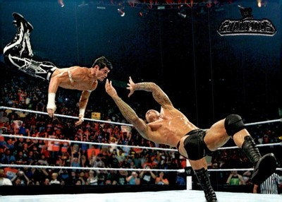 2011 Topps WWE Champions #48 Randy Orton's RKO on Evan Bourne