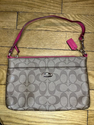 Borsa da polso Coach Signature in PVC marrone e rosa perfette condizioni come nuova!