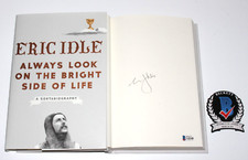 ERIC IDLE of MONTY PYTHON SIGNED ALWAYS LOOK ON THE BRIGHT SIDE BOOK BECKETT COA