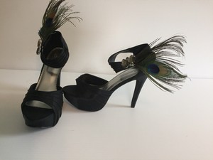 peacock heels with feathers