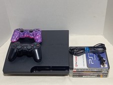 Sony PlayStation 3 With Two Controllers And 4...