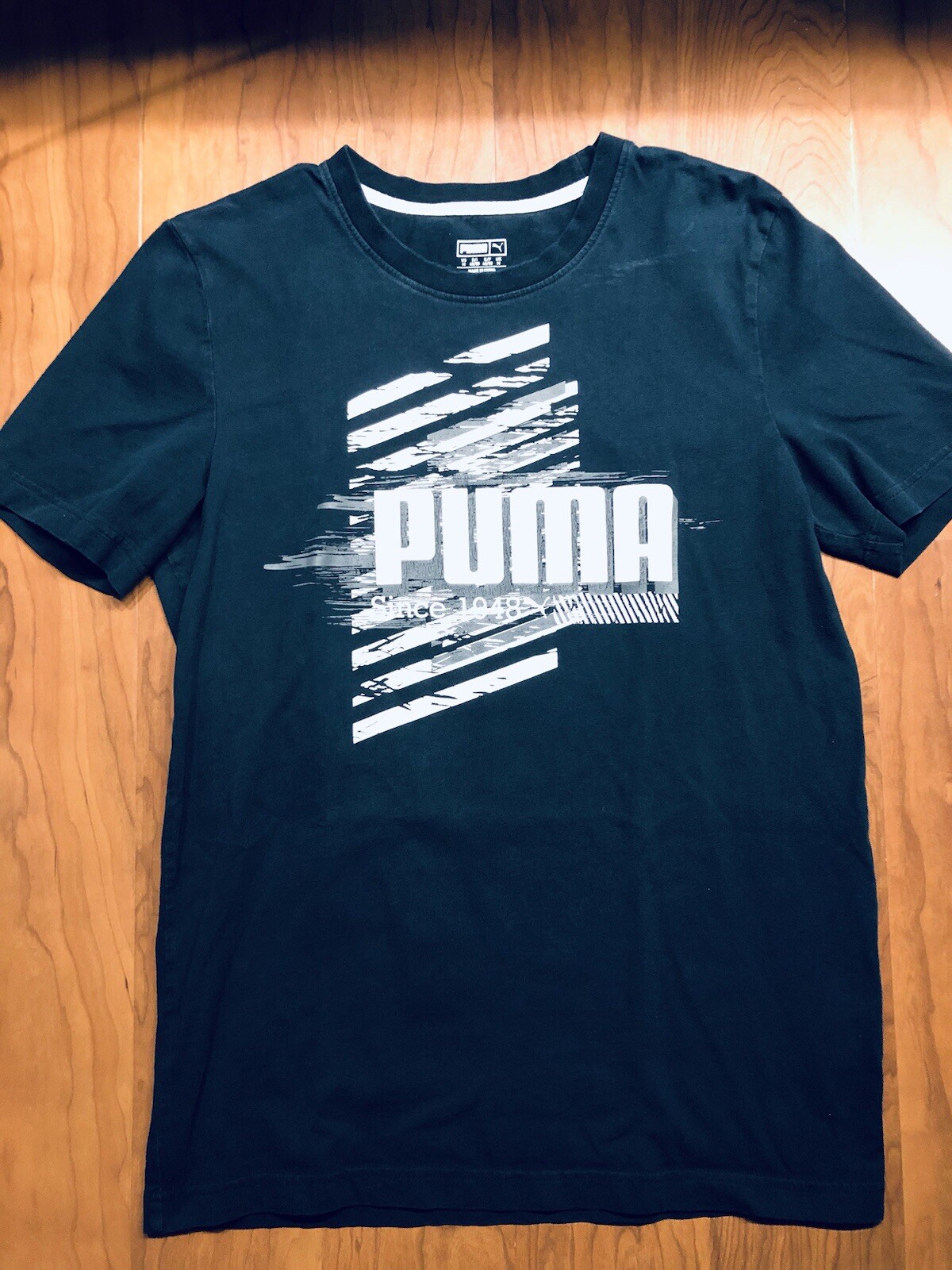 Puma Lusie Black T Shirt With Signature Logo in Black Size Adult Medium