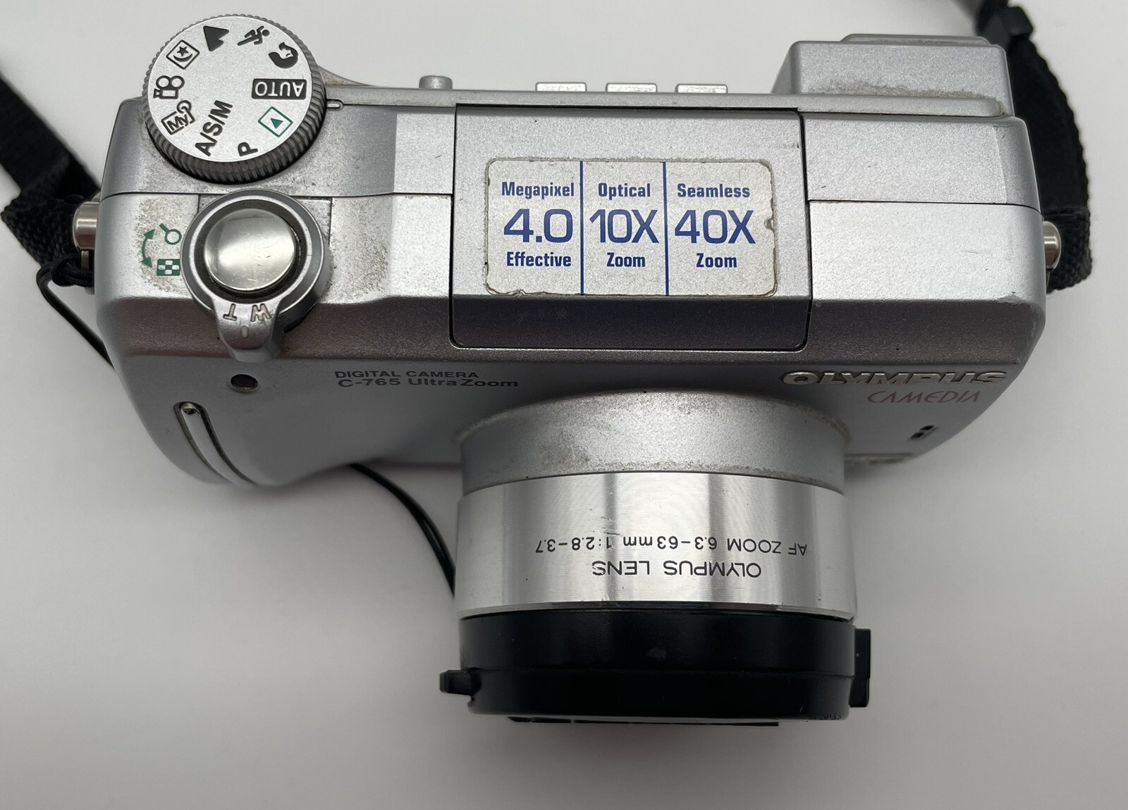 Olympus CAMEDIA C765 Ultra Zoom 4.0MP Digital Camera Silver Read