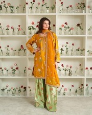 Classic Look Heavy French Crepe Salwar Kameez With Orange Dupatta For Function