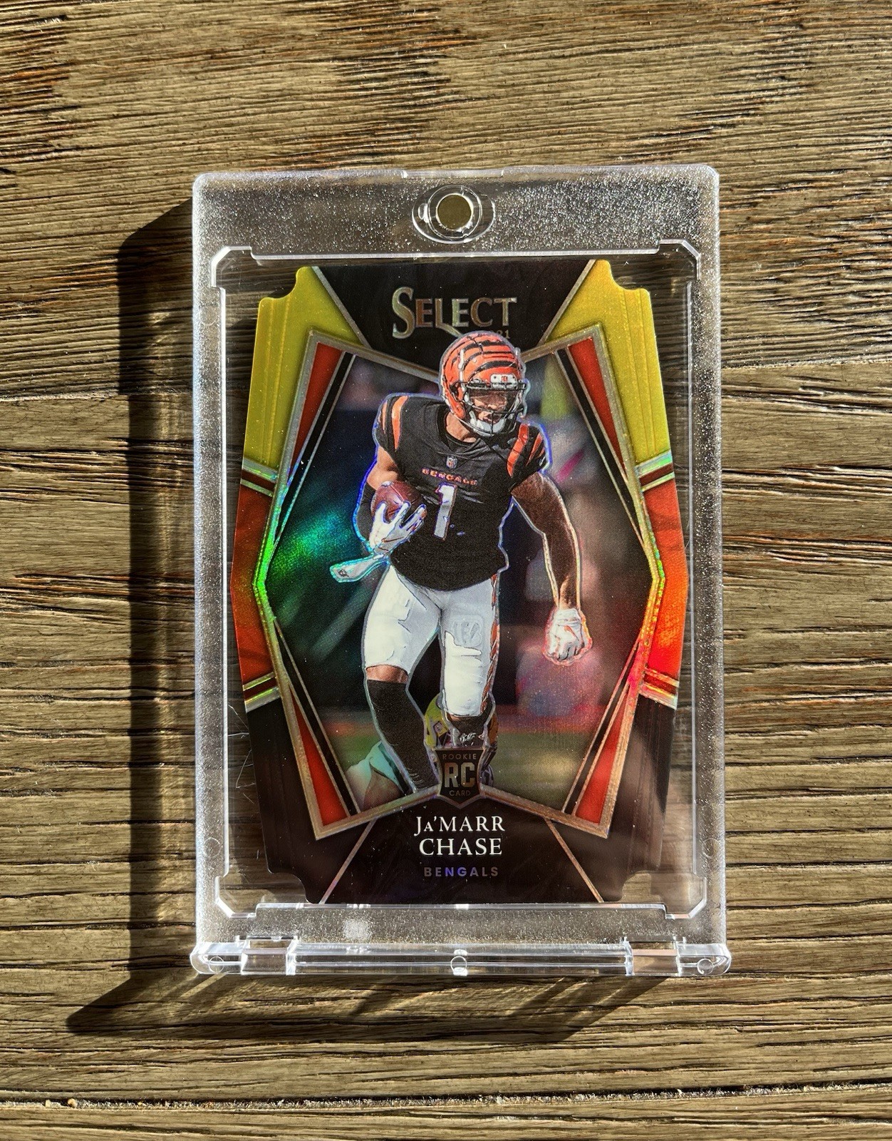 2021 Panini Select Premier Level Ja'Marr Chase #147 (RC) Gold/Black Die Cut