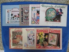 Seven (7) Cross-Stitch & Country Crafts Keepsake Calendars 1988-1993, & 1995